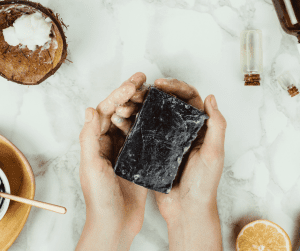holding charcoal soap
